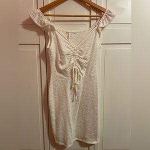 White ruffled sleeve mini tank dress. Size: S